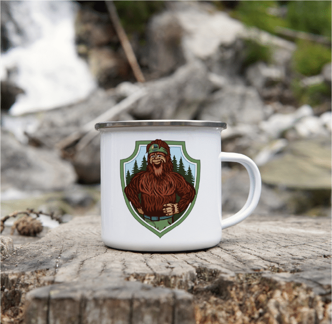 Bigfoot mug on wood stump